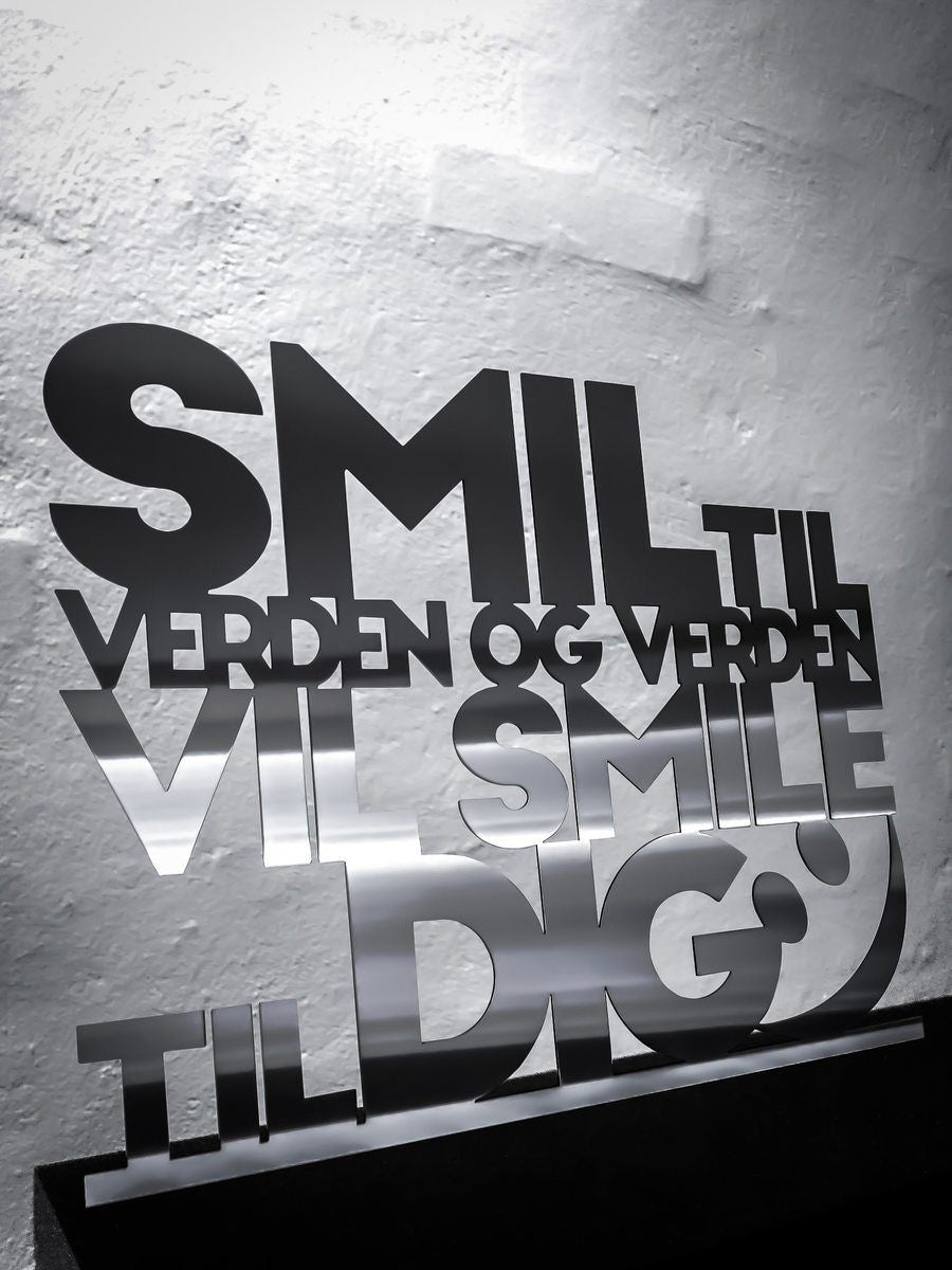 Smile to the world and the world will smile to you - Stainless steel 62x50cm