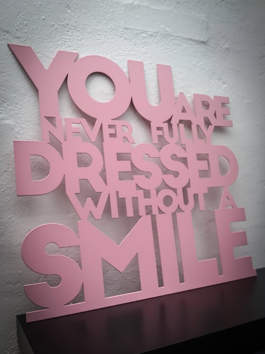 You are never fully dressed without a smile - Pink varnished 52.5x50cm